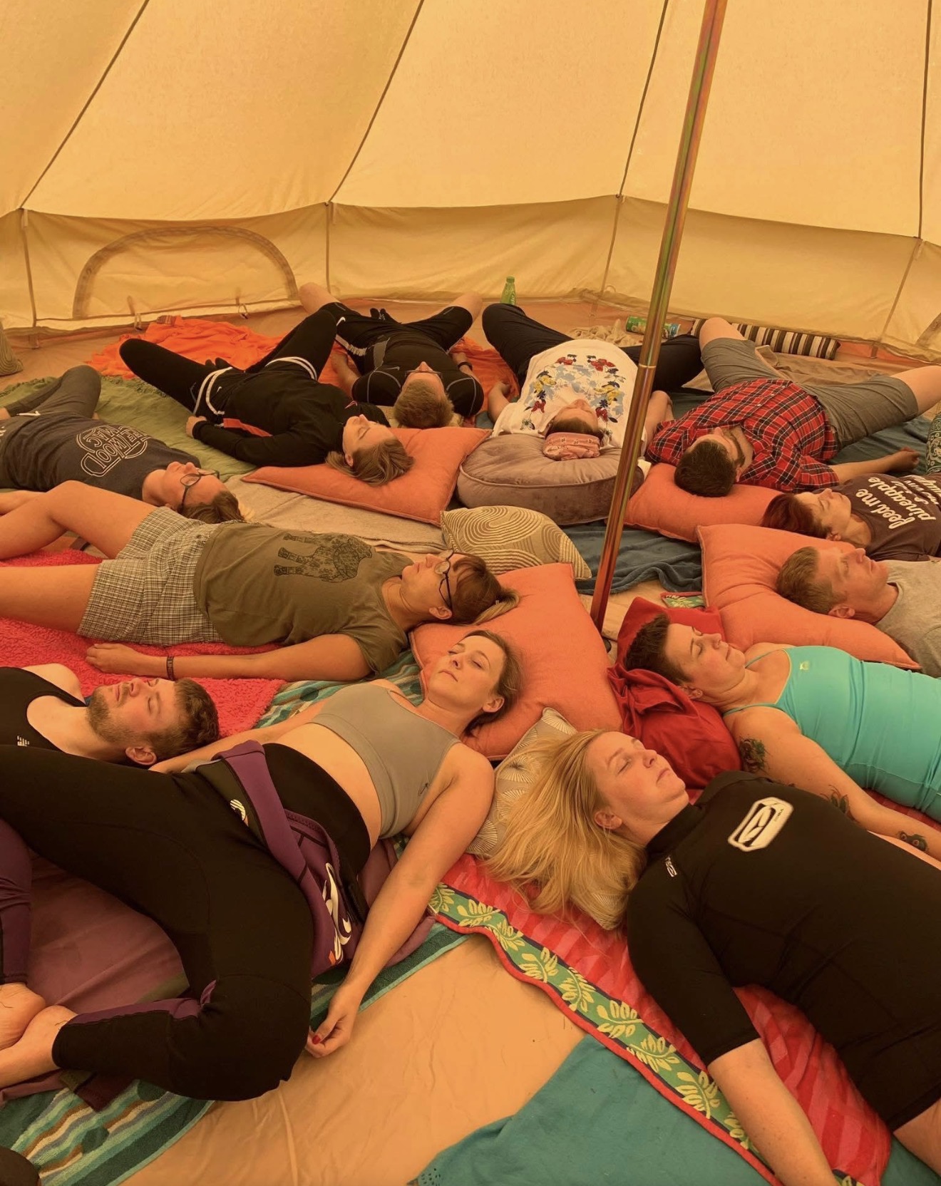 Thai yoga massage assisted stretch on a floor mattress